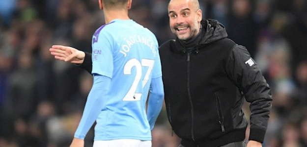 Cancelo y Guardiola