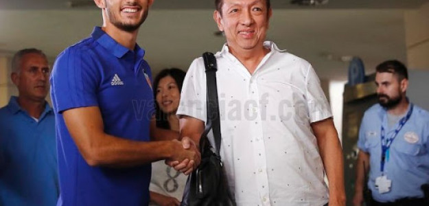Guedes y Peter Lim