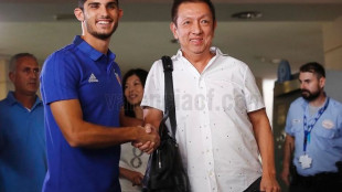 Guedes y Peter Lim