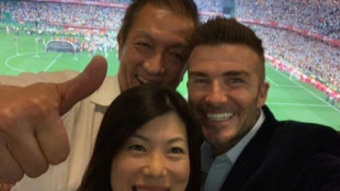 Lim con su pareja y David Beckham  