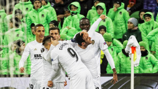 El Valencia celebrando el 1-1