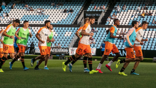 El Valencia calentando