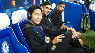 Kangin in Lee y Ferran Torres