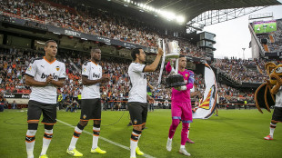 El Valencia con la Copa en Mestalla