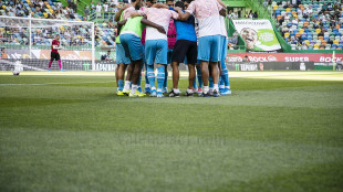 El Valencia calentando