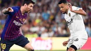 Coquelin y Messi