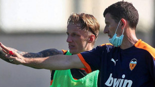 Daniel Wass y Javi Gracia