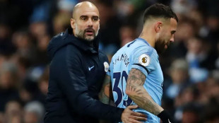Otamendi y Guardiola