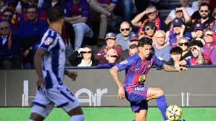 João Cancelo del FC Barcelona en acción durante el partido de liga contra el Levante UD.