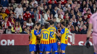 Jugadores del Valencia CF celebrando la victoria ante el Sevilla en el Pizjuán